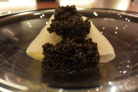 Zurriola's speciality - caviar that has been smoked over grap twigs and konbu seaweed served generously atop a ravioli filled with a burned onion cream sauce. One of a kind.