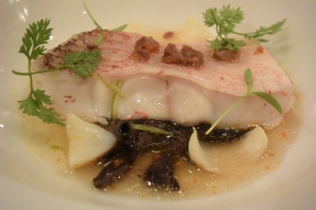 Tai (tilefish) simply steamed in a pungent Spanish liquor, topped with chorizo and served over trumped mushrooms in a coconut water broth. Tasty, but a tad on the sweet side.